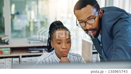 Computer, black woman and manager training or coaching employee and helping with project, work or collaboration in Nigeria. Mentor, corporate intern and talking about a question, error or pc learning Computer, black woman and manager training or coaching employee and helping with project, work or collaboration in Nigeria. Mentor, corporate intern and talking about a question, error or pc learning 138965743