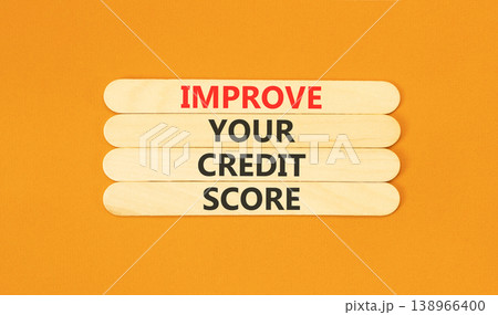 Improve your credit score words symbol. Concept words Improve your credit score on beautiful wooden sticks. Beautiful orange background. Business improve your credit score concept. Copy space. Improve your credit score words symbol. Concept words Improve your credit score on beautiful wooden sticks. Beautiful orange background. Business improve your credit score concept. Copy space. 138966400