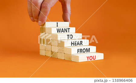I want to hear from you symbol. Concept words I want to hear from you on beautiful wooden sticks. Beautiful orange paper background. Business support I want to hear from you concept. Copy space. 138966406