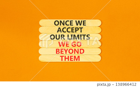 Beyond limits symbol. Concept words Once we accept our limits we go beyond them on wooden Sticks. Beautiful orange background. Business Once we accept our limits we go beyond them concept. Copy space. 138966412