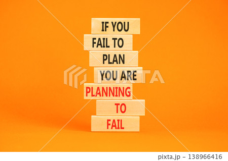 Planning to fail symbol. Concept words If you fail to plan you are planning to fail on beautiful wooden blocks. Beautiful orange paper background. Business planning to fail concept. Copy space. 138966416