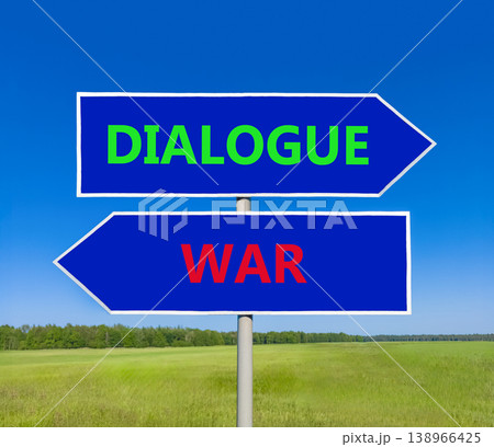 Dialogue instead war symbol. Concept words Dialogue and War on beautiful blue road sign. Beautiful blue sky green grass background. Social and dialogue instead war concept. Copy space. 138966425
