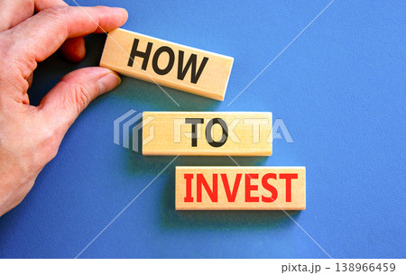 How to invest words symbol. Concept words How to invest on beautiful wooden blocks. Beautiful blue background. Businessman hand. Business and how to invest concept. Copy space. How to invest words symbol. Concept words How to invest on beautiful wooden blocks. Beautiful blue background. Businessman hand. Business and how to invest concept. Copy space. 138966459