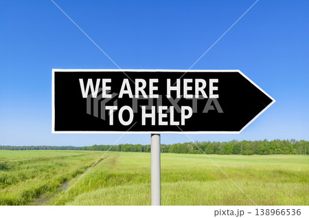 Support, help and we are here to help symbol. Concept words We are here to help on beautiful black road sign. Beautiful blue sky field background. Business we are here to help concept. Copy space. 138966536