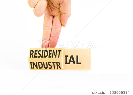 Industrial or residential symbol. Concept words Industrial or Residential on beautiful wooden blocks. Beautiful white background. Business industrial or residential concept. Copy space. 138966554
