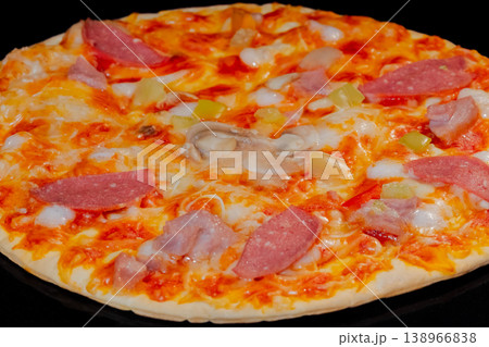 Homemade pizza baking on tray in electric oven: close up 138966838