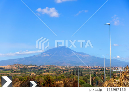 Majestic Etna volcano with sunny sky and natural landscape. 138967186