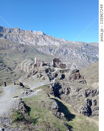 Signal tower ruins of Kurta and Taga, North Ossetia, Russia. Remains of a medieval stone tower with panoramic views of the surrounding Caucasus landscape Signal tower ruins of Kurta and Taga, North Ossetia, Russia. Remains of a medieval stone tower with panoramic views of the surrounding Caucasus landscape 138967249