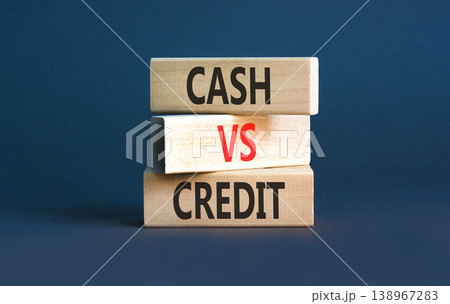 Cash vs credit words symbol. Concept words Cash vs credit on beautiful wooden blocks. Beautiful grey background. Business and cash vs credit concept. Copy space. Cash vs credit words symbol. Concept words Cash vs credit on beautiful wooden blocks. Beautiful grey background. Business and cash vs credit concept. Copy space. 138967283