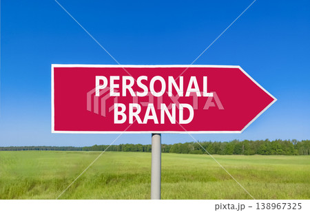Personal brand symbol. Concept words Personal brand on beautiful red road sign. Beautiful blue sky green grass field background. Business personal brand concept. Copy space. 138967325