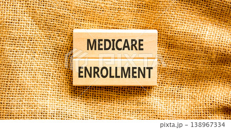 Medicare enrollment words symbol. Concept words Medicare enrollment on beautiful wooden blocks. Beautiful canvas background. Medical and Medicare enrollment words concept. Copy space. Medicare enrollment words symbol. Concept words Medicare enrollment on beautiful wooden blocks. Beautiful canvas background. Medical and Medicare enrollment words concept. Copy space. 138967334