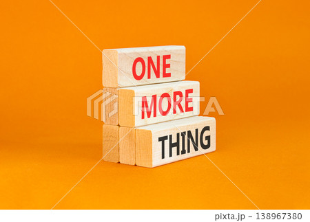 One more thing words symbol. Concept words One more thing on beautiful wooden blocks. Beautiful orange background. Business and one more thing concept. Copy space. One more thing words symbol. Concept words One more thing on beautiful wooden blocks. Beautiful orange background. Business and one more thing concept. Copy space. 138967380