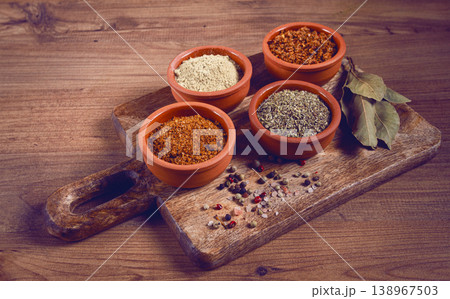 Georgian spices, in ceramic bowls, assortment, set of spices, utsho, adjika, Svan salt, ground coriander, top view, no people, Georgian spices, in ceramic bowls, assortment, set of spices, utsho, adjika, Svan salt, ground coriander, top view, no people, 138967503