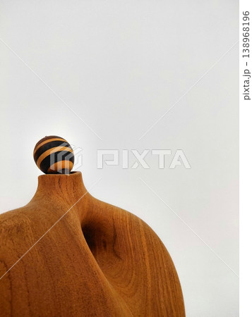 Minimalist wooden sculpture with abstract curves Minimalist wooden sculpture with abstract curves 138968196