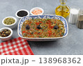 Traditional Turkish Roasted Eggplant Salad Meze with Garlic and Olive Oil on a Rustic Plate Backdrop 138968362