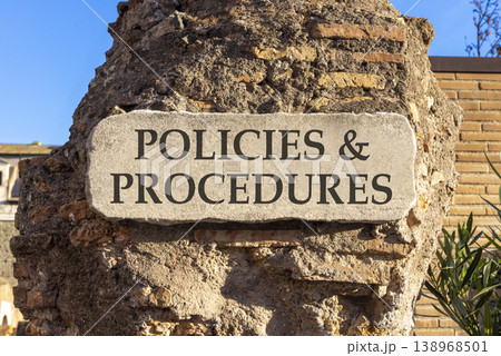 Policies and procedures symbol. Concept words Policies and procedures on beautiful big white sign plate. Beautiful old brown brick wall background. Business policies procedures concept. Copy space Policies and procedures symbol. Concept words Policies and procedures on beautiful big white sign plate. Beautiful old brown brick wall background. Business policies procedures concept. Copy space 138968501