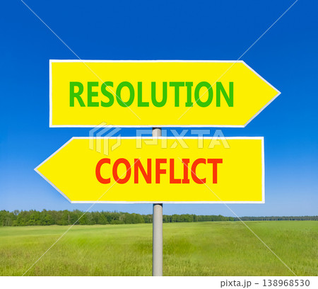 Resolution and conflict symbol. Concept words Resolution and Conflict on beautiful yellow road sign. Beautiful blue sky green grass background. Social resolution instead conflict concept. Copy space. 138968530