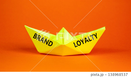 Brand loyalty words symbol. Concept words Brand loyalty on beautiful yellow paper boat. Beautiful orange background. Business and Brand loyalty words concept. Copy space. Brand loyalty words symbol. Concept words Brand loyalty on beautiful yellow paper boat. Beautiful orange background. Business and Brand loyalty words concept. Copy space. 138968537
