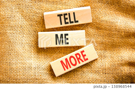 Tell me more words symbol. Concept words Tell me more on beautiful wooden blocks. Beautiful canvas background. Business and tell me more concept. Copy space. 138968544