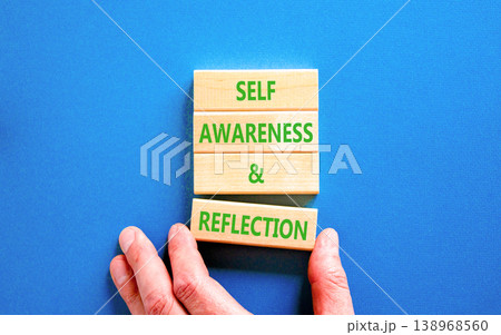 Self awareness and reflection symbol. Concept words Self awareness and reflection on beautiful wooden blocks. Beautiful blue background. Psychological self awareness reflection concept. Copy space. 138968560