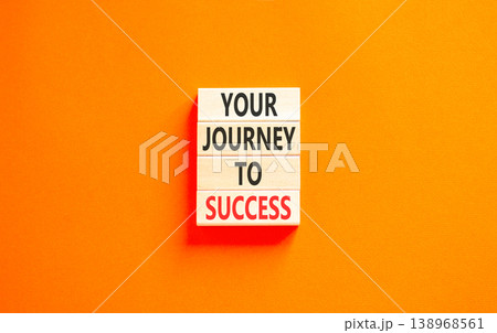 Your journey to success words symbol. Concept words Your journey to success on beautiful wooden blocks. Beautiful orange background. Business motivational your journey to success concept. Copy space. 138968561
