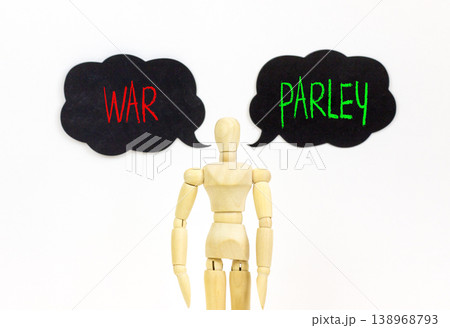 Parley instead war symbol. Concept words Parley and War on beautiful black speech bubbles. Beautiful white background. Businessman model. Social and parley instead war concept. Copy space. Parley instead war symbol. Concept words Parley and War on beautiful black speech bubbles. Beautiful white background. Businessman model. Social and parley instead war concept. Copy space. 138968793