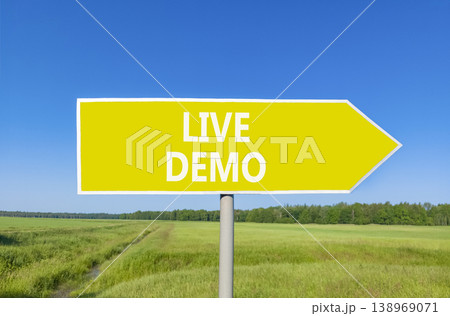 Live demo symbol. Concept words Live demo on beautiful yellow road sign. Beautiful blue sky green grass field background. Copy space. Business and live demo concept. Live demo symbol. Concept words Live demo on beautiful yellow road sign. Beautiful blue sky green grass field background. Copy space. Business and live demo concept. 138969071