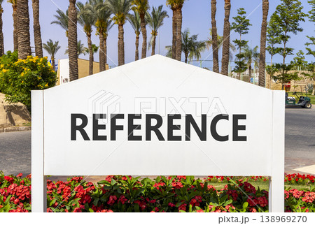References or reference symbol. Concept word Reference on beautiful big white road sign. Beautiful blue sky and palm trees background. Business references or reference concept. Copy space. References or reference symbol. Concept word Reference on beautiful big white road sign. Beautiful blue sky and palm trees background. Business references or reference concept. Copy space. 138969270