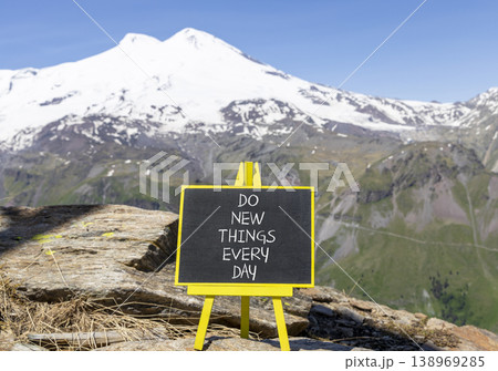 Do new things every day words symbol. Concept words Do new things every day on beautiful black blackboard. Beautiful mountain Elbrus background. Business do new things every day concept. Copy space. Do new things every day words symbol. Concept words Do new things every day on beautiful black blackboard. Beautiful mountain Elbrus background. Business do new things every day concept. Copy space. 138969285