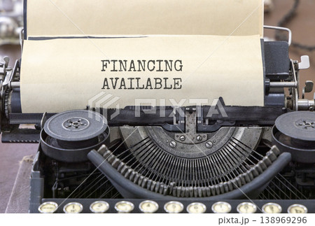 Financing available symbol. Concept words Financing available typed on beautiful old retro typewriter. Beautiful white paper background. Business financing available concept. Copy space. Financing available symbol. Concept words Financing available typed on beautiful old retro typewriter. Beautiful white paper background. Business financing available concept. Copy space. 138969296