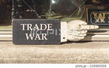 Trade war symbol. Concept word Trade war on beautiful black wooden hand with finger. Beautiful shop display background. Business trade war concept. Copy space. 138969308