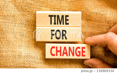 Time for change symbol. Concept words Time for change on beautiful wooden blocks. Beautiful canvas background. Businessman hand. Business and time for change concept. Copy space. 138969338
