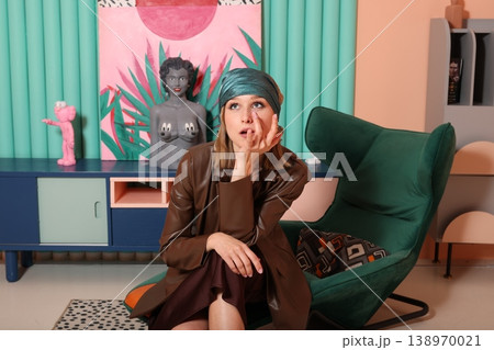 Contemplative woman with vivid teal hair amid nostalgic ambiance Contemplative woman with vivid teal hair amid nostalgic ambiance 138970021