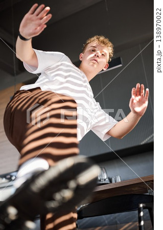 White male actor reaching out in rehearsal with surprise 138970022
