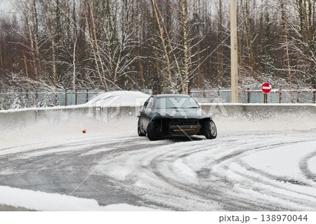 Dynamic winter driving scene capturing tire tracks and motion Dynamic winter driving scene capturing tire tracks and motion 138970044