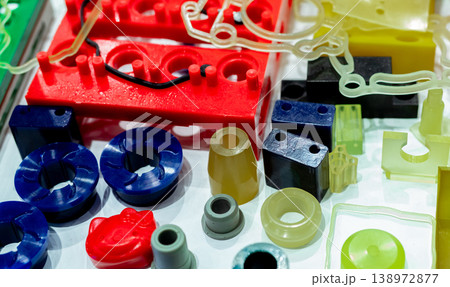 Engineering plastics. Plastic material used in manufacturing industry. Global engineering plastic market concept. Polyurethane and abs plastic parts materials. Plastic injection machine products. 138972877