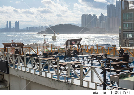 Rooftop bar and restaurant by Haeundae beach at sunset, Busan Rooftop bar and restaurant by Haeundae beach at sunset, Busan 138973571