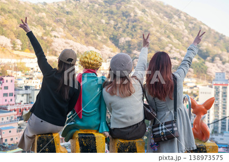 Korean women at Little Prince sculpture in Gamcheon Village, Busan 138973575