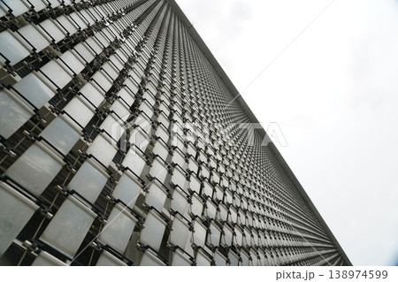 Modern Building Facade with White Panels and Sky View 138974599