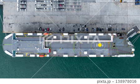 Aerial view cargo vehicles car carrier at import export cars terminal seaport, Vehicle car carrier vessel loading cars for shipping to worldwide, Automotive industry distribution logistic transport Aerial view cargo vehicles car carrier at import export cars terminal seaport, Vehicle car carrier vessel loading cars for shipping to worldwide, Automotive industry distribution logistic transport 138978016