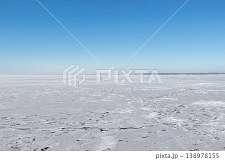 Surface of a frozen river Surface of a frozen river 138978155