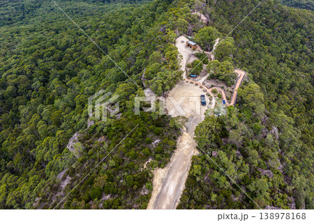 Aerial view over Hargraves Lookout in the Blue Mountains, New South Wales, Australia. The scenic landscape shows dramatic sandstone cliffs, deep valleys and forest covered wilderness Aerial view over Hargraves Lookout in the Blue Mountains, New South Wales, Australia. The scenic landscape shows dramatic sandstone cliffs, deep valleys and forest covered wilderness 138978168