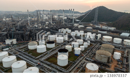 Aerial view oil and gas refinery petrochemical storage tank and pipeline steel, Oil and gas transportation system pipeline steel at oil and gas refinery industry chemical plant, Pipeline oil and gas. Aerial view oil and gas refinery petrochemical storage tank and pipeline steel, Oil and gas transportation system pipeline steel at oil and gas refinery industry chemical plant, Pipeline oil and gas. 138978337