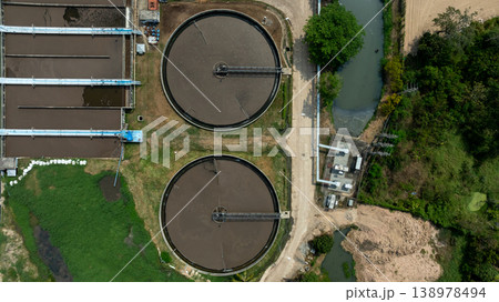 Aerial view wastewater treatment plant. Circular sedimentation tanks biological reactor, Water cleaning facility wastewater treatment plant, Recirculation solid contact clarifier sedimentation tank. 138978494