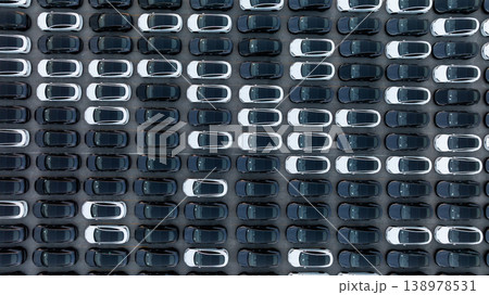 Aerial view car for sale stock lot row, Cars dealership inventory distribution automobile and automotive business, New cars parking for sale automobile automotive industry business. Aerial view car for sale stock lot row, Cars dealership inventory distribution automobile and automotive business, New cars parking for sale automobile automotive industry business. 138978531
