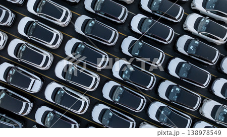 Aerial view car for sale stock lot row, Cars dealership inventory distribution automobile and automotive business, New cars parking for sale automobile automotive industry business. Aerial view car for sale stock lot row, Cars dealership inventory distribution automobile and automotive business, New cars parking for sale automobile automotive industry business. 138978549