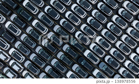 Aerial view car for sale stock lot row, Cars dealership inventory distribution automobile and automotive business, New cars parking for sale automobile automotive industry business. Aerial view car for sale stock lot row, Cars dealership inventory distribution automobile and automotive business, New cars parking for sale automobile automotive industry business. 138978556