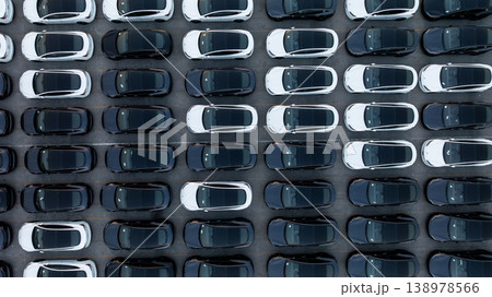 Aerial view car for sale stock lot row, Cars dealership inventory distribution automobile and automotive business, New cars parking for sale automobile automotive industry business. 138978566