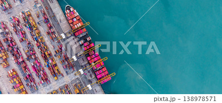 Aerial view Container cargo ship loading unloading container import export sea port, Global trade business container cargo ship freight shipping commercial trade logistic transportation international. Aerial view Container cargo ship loading unloading container import export sea port, Global trade business container cargo ship freight shipping commercial trade logistic transportation international. 138978571