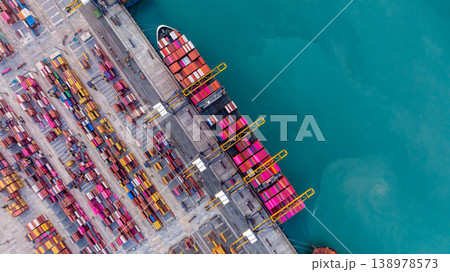 Aerial view Container cargo ship loading unloading container import export sea port, Global trade business container cargo ship freight shipping commercial trade logistic transportation international. Aerial view Container cargo ship loading unloading container import export sea port, Global trade business container cargo ship freight shipping commercial trade logistic transportation international. 138978573